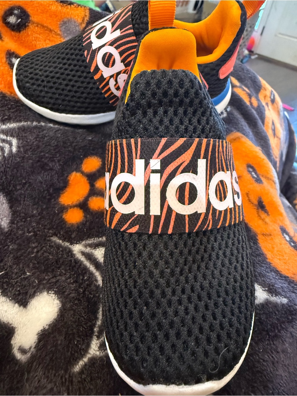 adidas Kids Black Slip-On Sneakers with Orange Accents